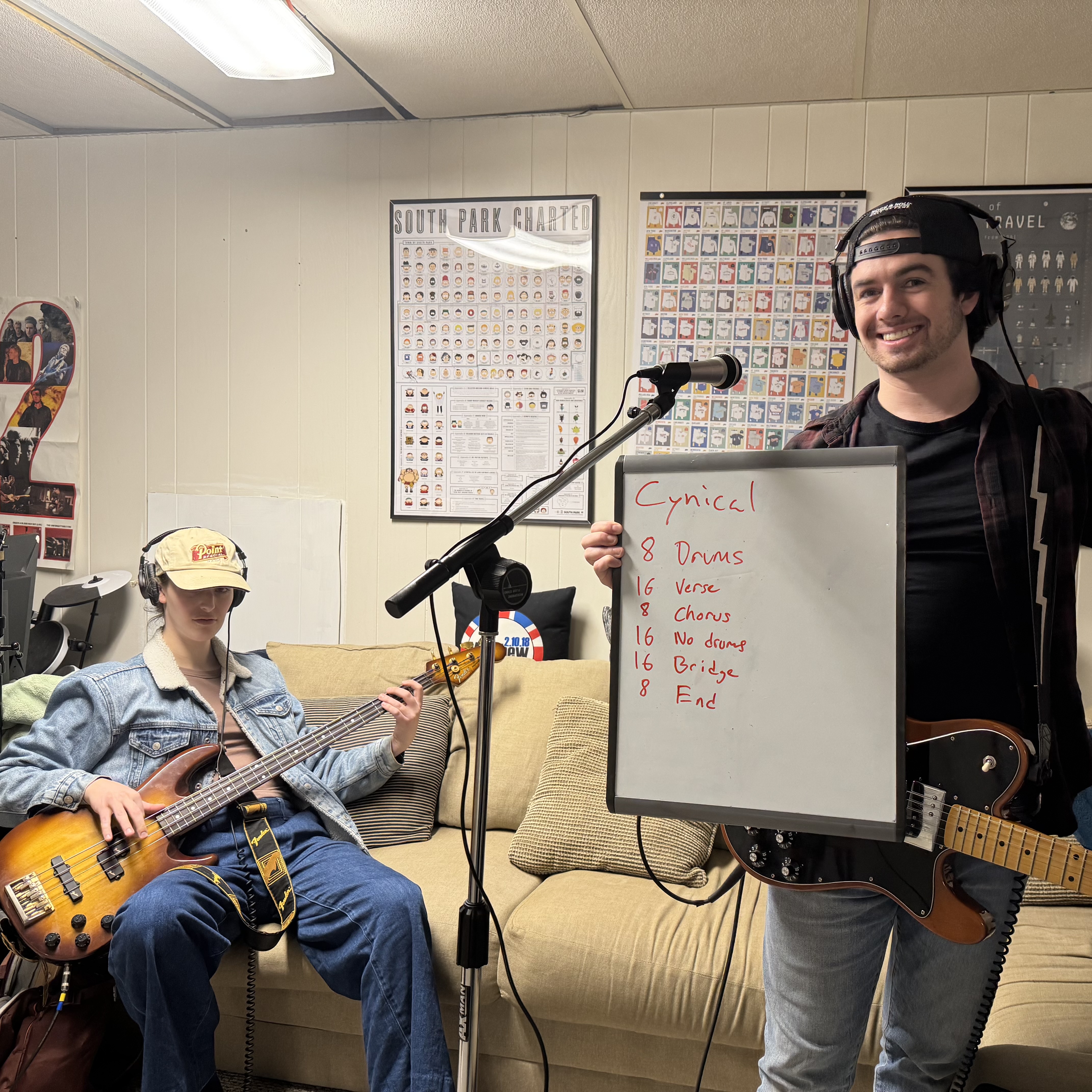 Guitarist recording with vintage amplifier